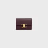 Cartera compacta con monedero Triomphe en piel de becerro brillante
