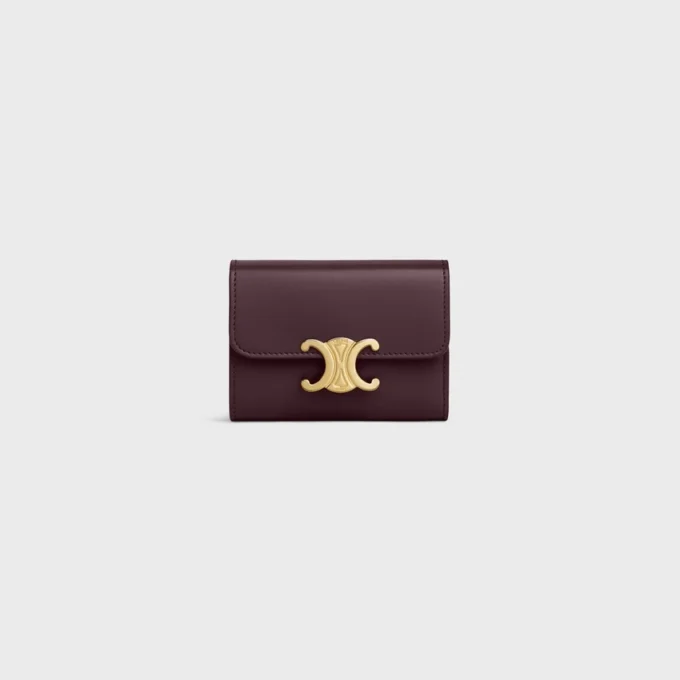 Cartera compacta con monedero Triomphe en piel de becerro brillante