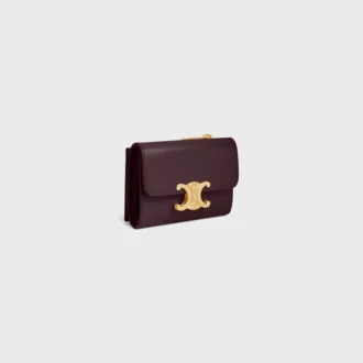 Cartera compacta con monedero Triomphe en piel de becerro brillante