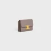 Cartera compacta con monedero Triomphe en piel de becerro brillante