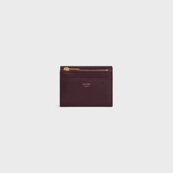 Cartera compacta con monedero Triomphe en piel de becerro brillante