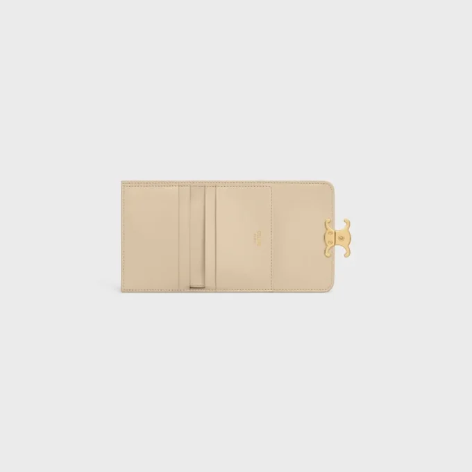 Cartera compacta con monedero Triomphe en piel de becerro brillante