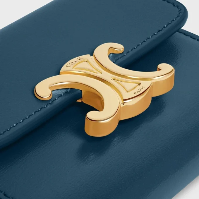 Cartera compacta con monedero Triomphe en piel de becerro brillante