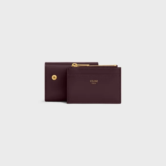 Cartera compacta con monedero Triomphe en piel de becerro brillante