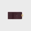Cartera compacta con monedero Triomphe en piel de becerro brillante