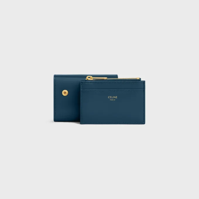 Cartera compacta con monedero Triomphe en piel de becerro brillante
