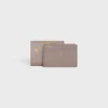 Cartera compacta con monedero Triomphe en piel de becerro brillante