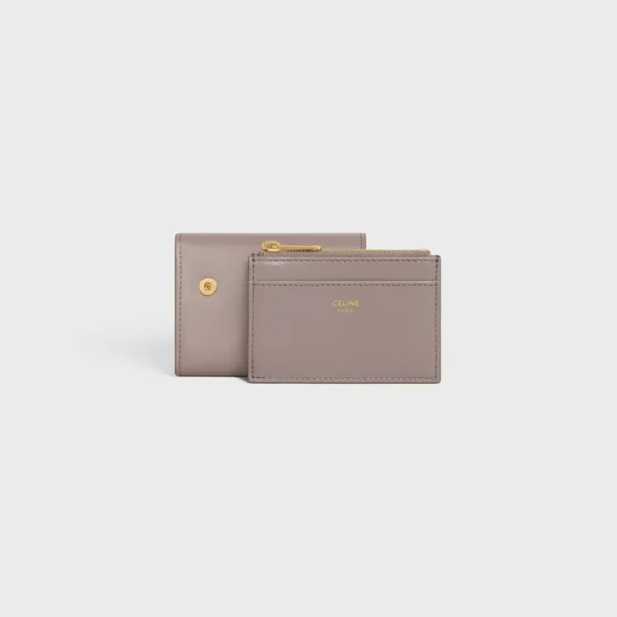 Cartera compacta con monedero Triomphe en piel de becerro brillante
