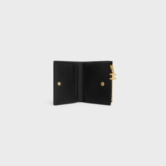 Cartera compacta Triomphe Charms en piel de becerro granulada