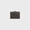Cartera con correa fina Nino en Triomphe Canvas