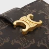 Cartera con correa fina Nino en Triomphe Canvas