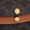 Cartera Duo con correa en Triomphe Canvas y piel de becerro Cartera Duo con correa en Triomphe Canvas y piel de becerro