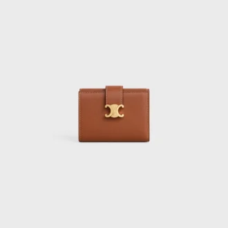 Cartera Nino con correa fina en piel de becerro granulada y flexible