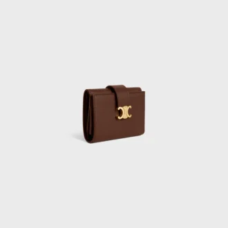 Cartera Nino con correa fina en piel de becerro granulada y flexible