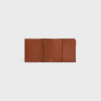 Cartera Nino con correa fina en piel de becerro granulada y flexible