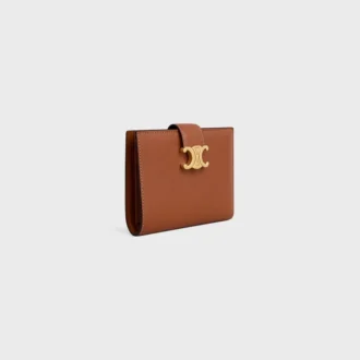 Cartera Nino de correa mediana en piel de becerro granulada flexible
