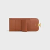 Cartera pequeña con solapa Triomphe Canvas