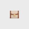 Cartera pequeña con solapa Triomphe en tejido y piel de becerro Cartera pequeña con solapa Triomphe en tejido y piel de becerro