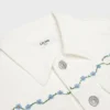 Chaqueta vaquera con bordados en denim blanco lavado al natural Chaqueta vaquera con bordados en denim blanco lavado al natural