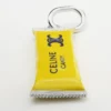 Charms Barrita de caramelo en esmalte y latón con acabado de rodio