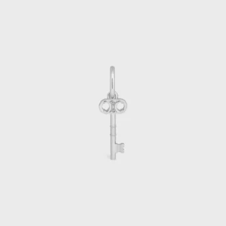 Charms Llave Triomphe en latón con acabado de rodio