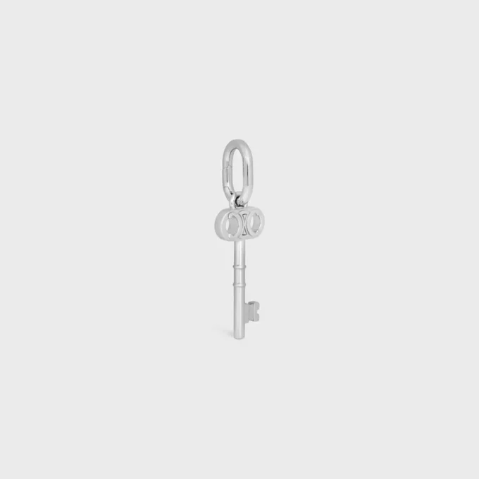 Charms Llave Triomphe en latón con acabado de rodio Charms Llave Triomphe en latón con acabado de rodio