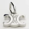 Charms Triomphe en latón con acabado de rodio Charms Triomphe en latón con acabado de rodio