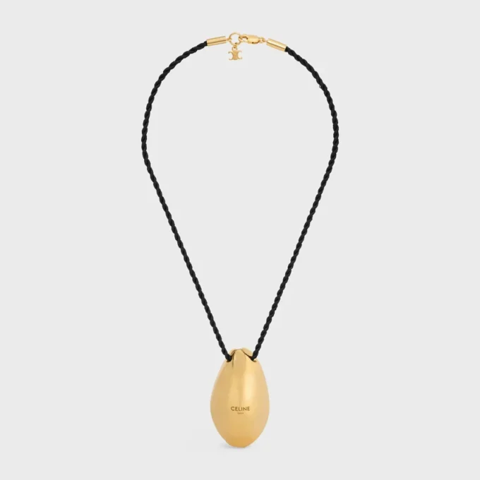 Collar CELINE Dafila con conchas en latón con acabado dorado y seda Collar CELINE Dafila con conchas en latón con acabado dorado y seda