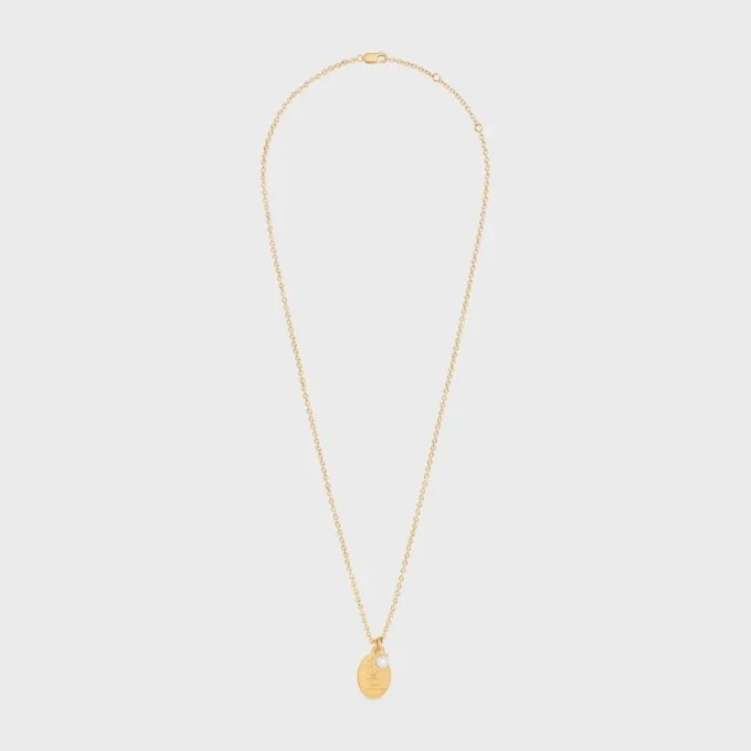 Collar con medalla CELINE de resina perlada y latón con acabado dorado Collar con medalla CELINE de resina perlada y latón con acabado dorado