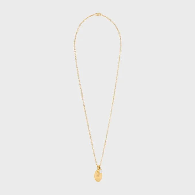 Collar con medalla CELINE de resina perlada y latón con acabado dorado Collar con medalla CELINE de resina perlada y latón con acabado dorado