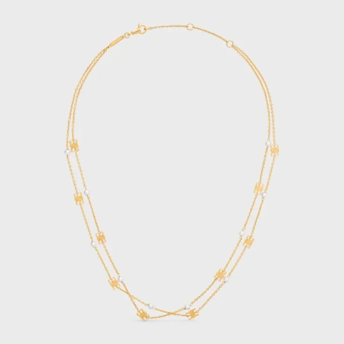 Collar doble Triomphe Pearl en latón con acabado dorado y perlas de resina Collar doble Triomphe Pearl en latón con acabado dorado y perlas de resina