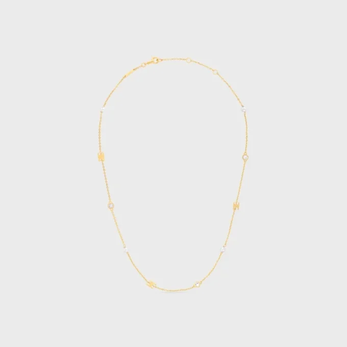 Collar Les Perles CELINE con strass, perlas de resina y latón con acabado dorado Collar Les Perles CELINE con strass, perlas de resina y latón con acabado dorado
