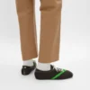 Las zapatillas planas en grosgrain, terciopelo, ante de cabra y piel de cordero