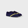 Las zapatillas planas en grosgrain, terciopelo, piel de becerro y piel de cordero