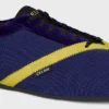 Las zapatillas planas en grosgrain, terciopelo, piel de becerro y piel de cordero