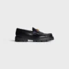 Mocasines Margaret con Triomphe en piel de toro pulida Mocasines Margaret con Triomphe en piel de toro pulida