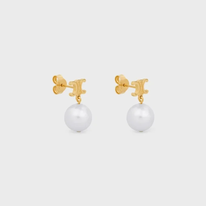 Pendientes Les Perles CELINE de latón con acabado dorado y perlas de resina Pendientes Les Perles CELINE de latón con acabado dorado y perlas de resina