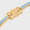 Pulsera articulada Triomphe en esmalte y latón con acabado dorado Pulsera articulada Triomphe en esmalte y latón con acabado dorado