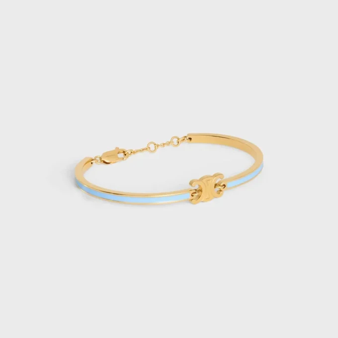Pulsera articulada Triomphe en esmalte y latón con acabado dorado Pulsera articulada Triomphe en esmalte y latón con acabado dorado