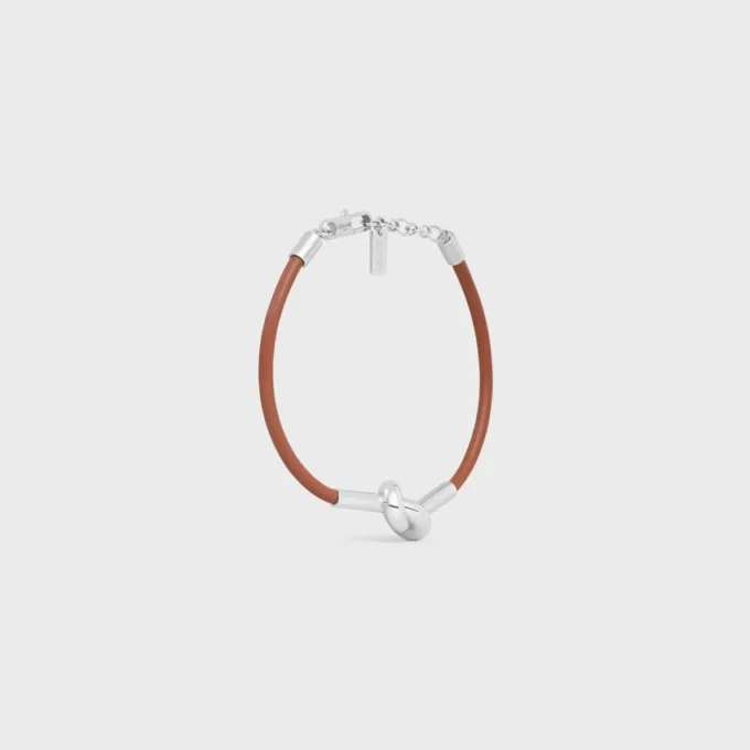 Pulsera con nudo en piel de becerro y latón con acabado de rodio Pulsera con nudo en piel de becerro y latón con acabado de rodio