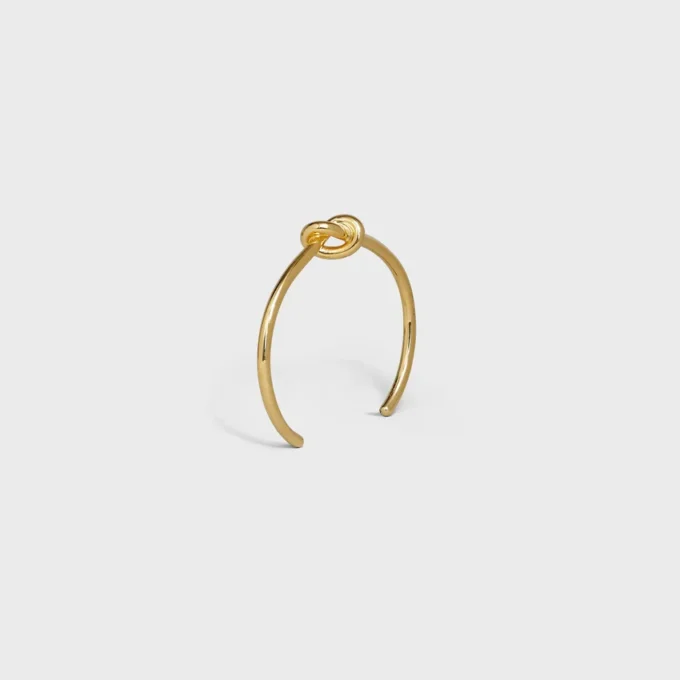 Pulsera extrafina Knot en latón con acabado dorado Pulsera extrafina Knot en latón con acabado dorado