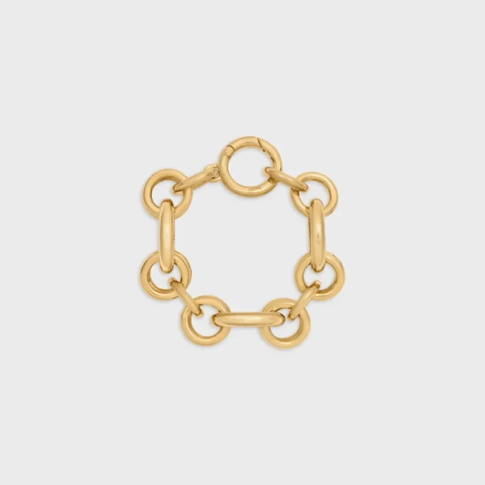 Pulsera gruesa CELINE Charms Heritage en latón con acabado dorado Pulsera gruesa CELINE Charms Heritage en latón con acabado dorado