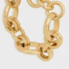 Pulsera gruesa CELINE Charms Heritage en latón con acabado dorado Pulsera gruesa CELINE Charms Heritage en latón con acabado dorado