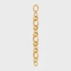 Pulsera gruesa CELINE Charms Heritage en latón con acabado dorado Pulsera gruesa CELINE Charms Heritage en latón con acabado dorado