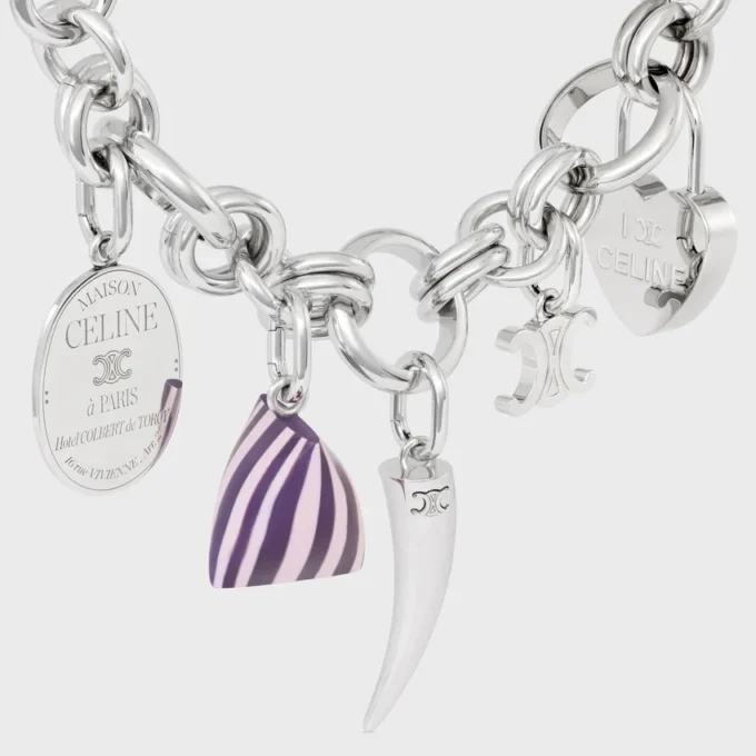 Pulsera gruesa Heritage con dijes en latón con acabado de rodio Pulsera gruesa Heritage con dijes en latón con acabado de rodio