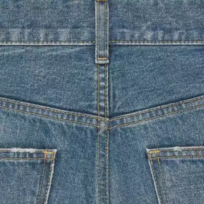 Vaqueros acampanados Dylan con firma en denim de algodón Vaqueros acampanados Dylan con firma en denim de algodón