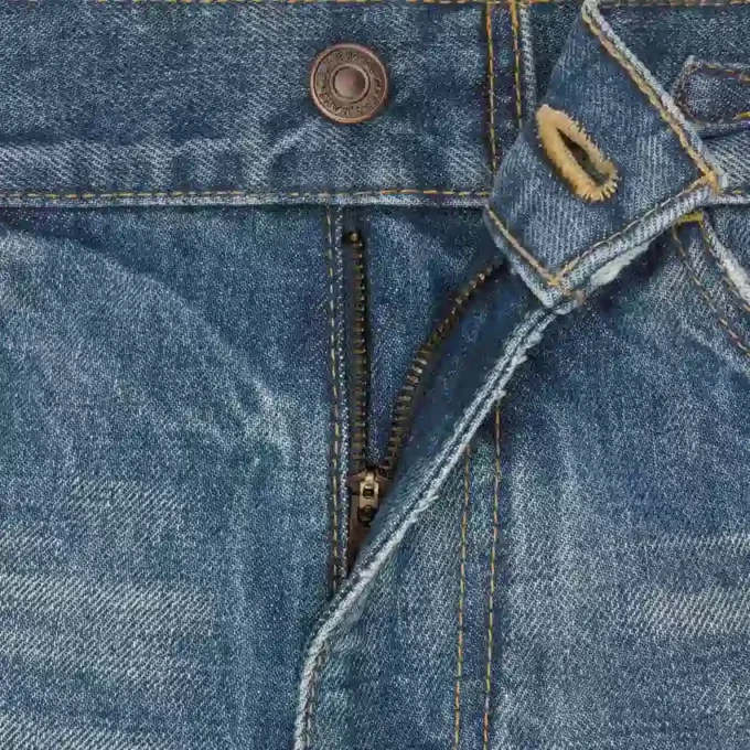 Vaqueros acampanados Dylan con firma en denim de algodón Vaqueros acampanados Dylan con firma en denim de algodón